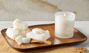 Soy wax scraps and a finished candle, showing how a candle making kit can support zero-waste crafting.