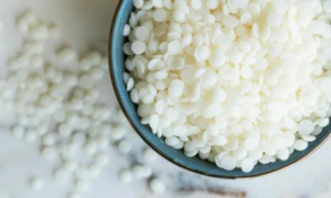 Soy wax pellets, a beginner-friendly option included in many candle making kits.