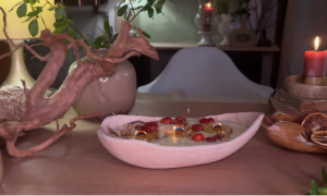 A decorative bowl candle, an advanced craft that builds on skills learned from a candle making kit.